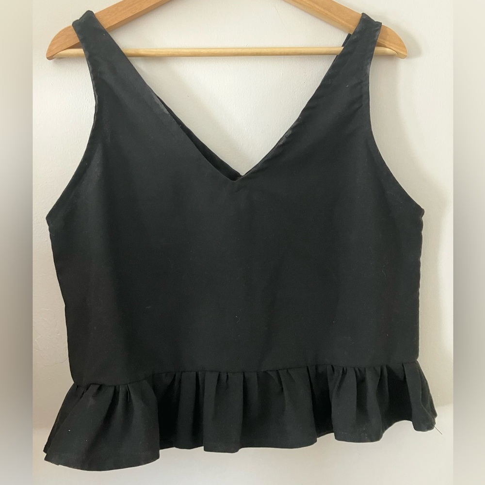 Black Sleeveless Ruffle Hem Top